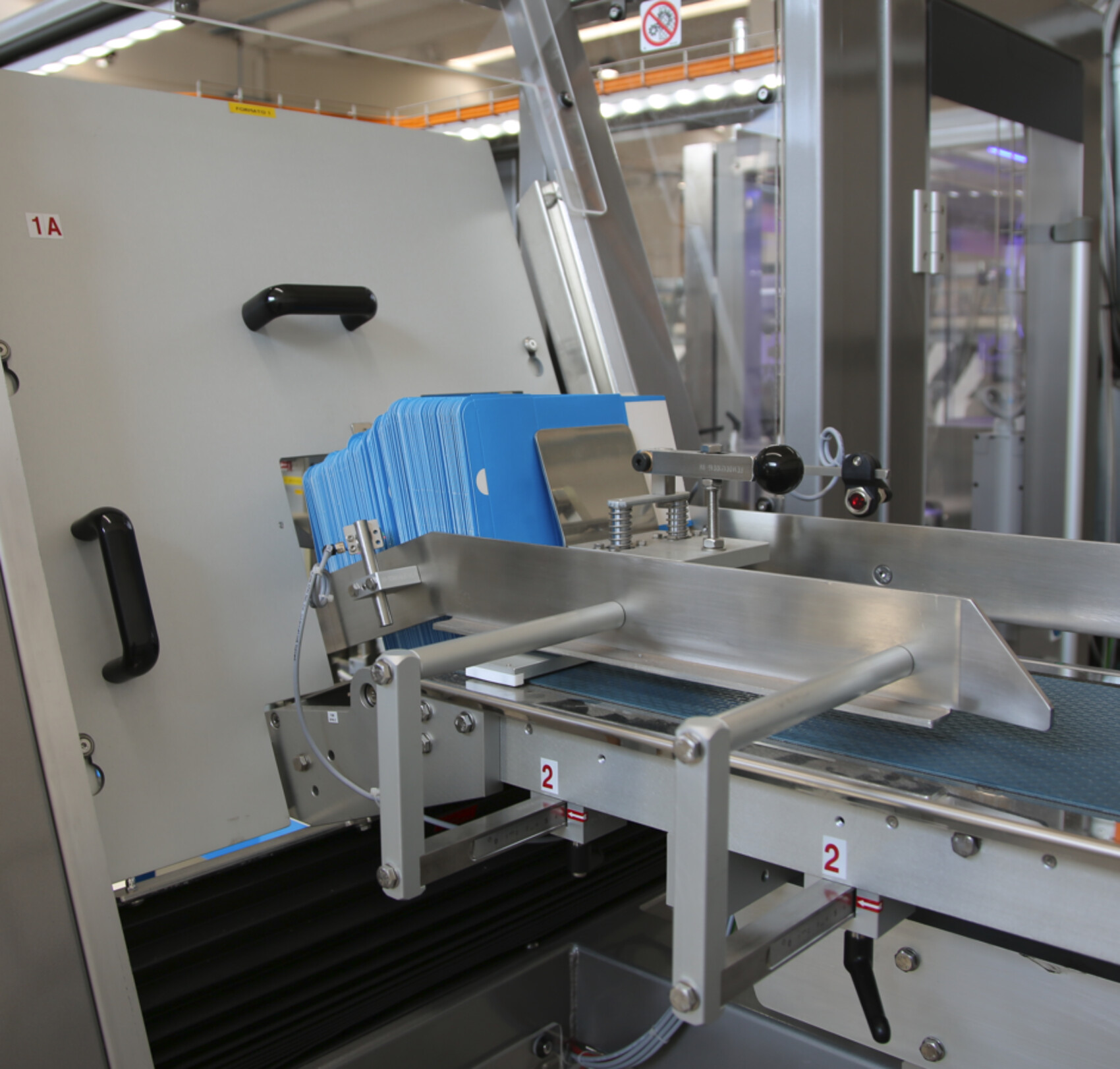Carton box infeed on cartoning machine for secondary packaging of Wound Care Products